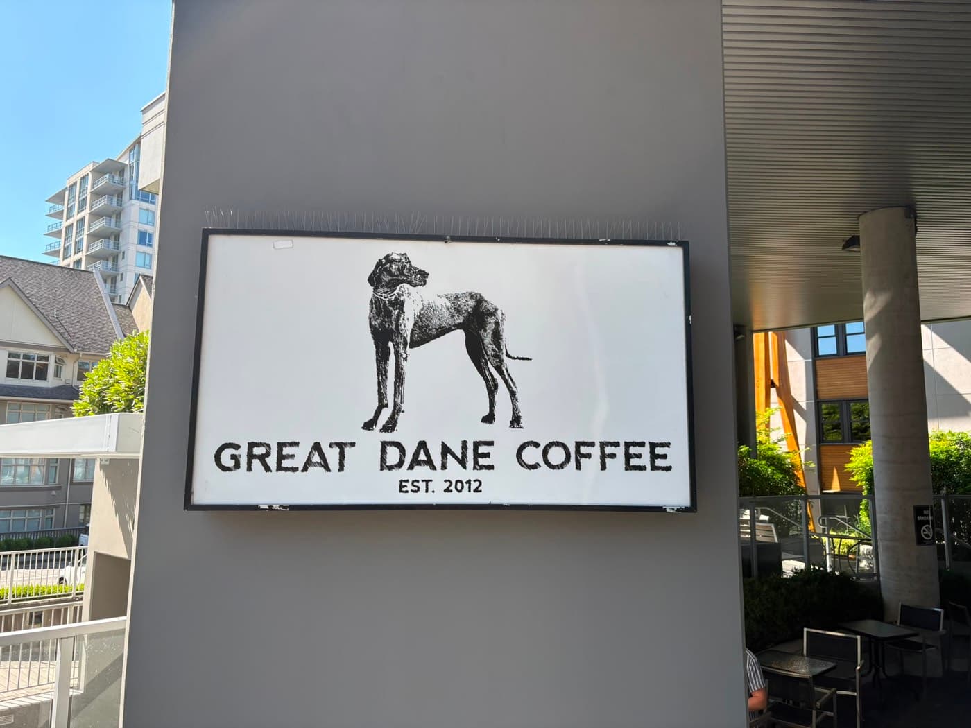 the Great Dane Coffee sign on the building exterior, est. 2012